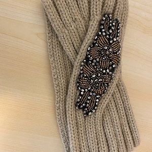 Beige Earmuff headband with beaded accents